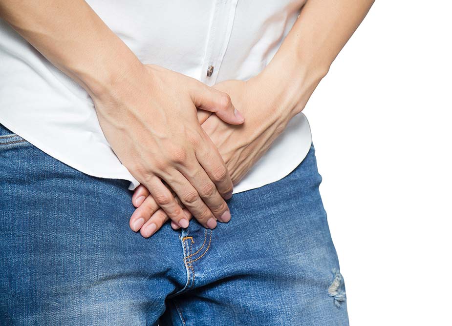 muškarac se drži za donji stomak - rak prostate